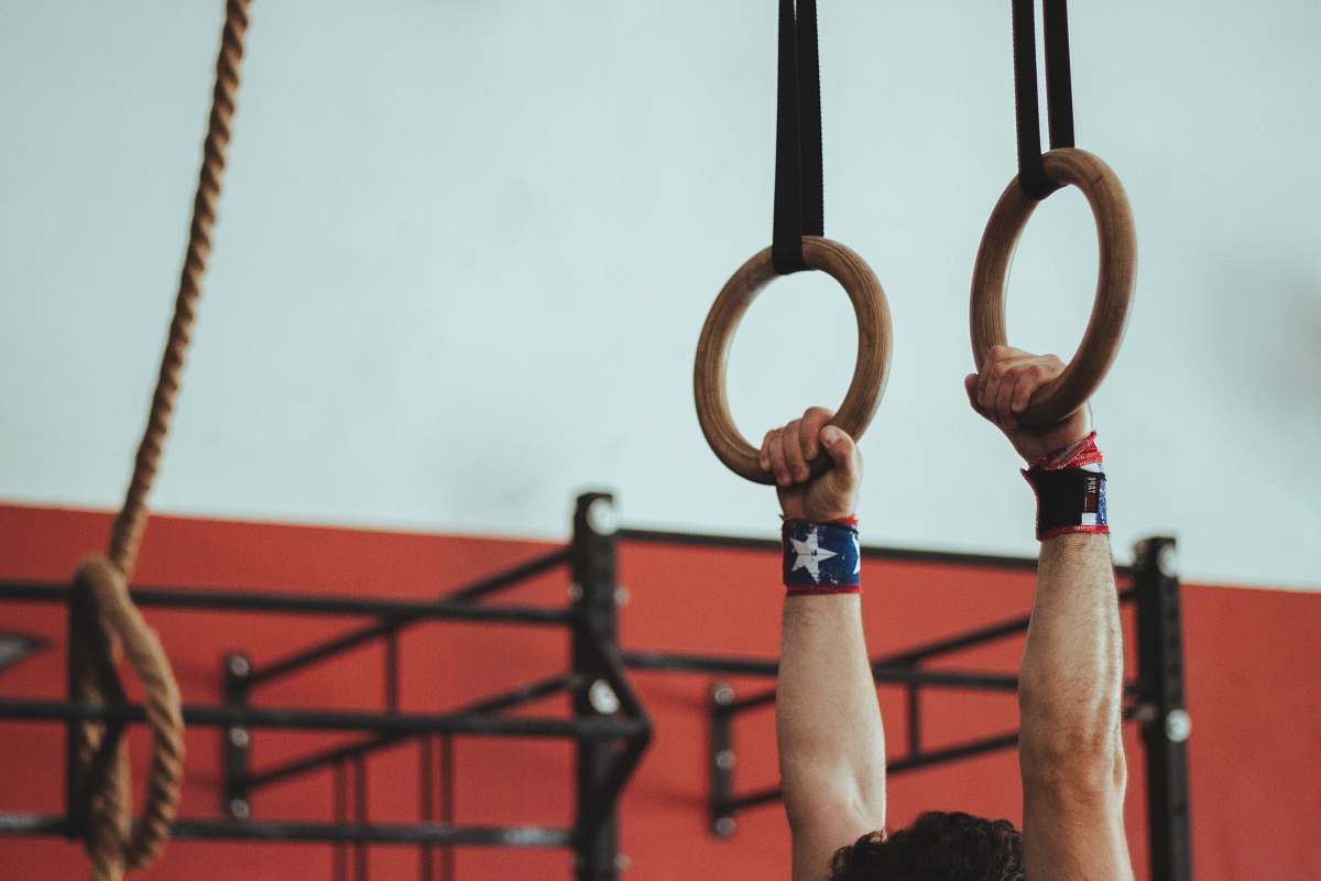 brazil man hanged on brown rings arm